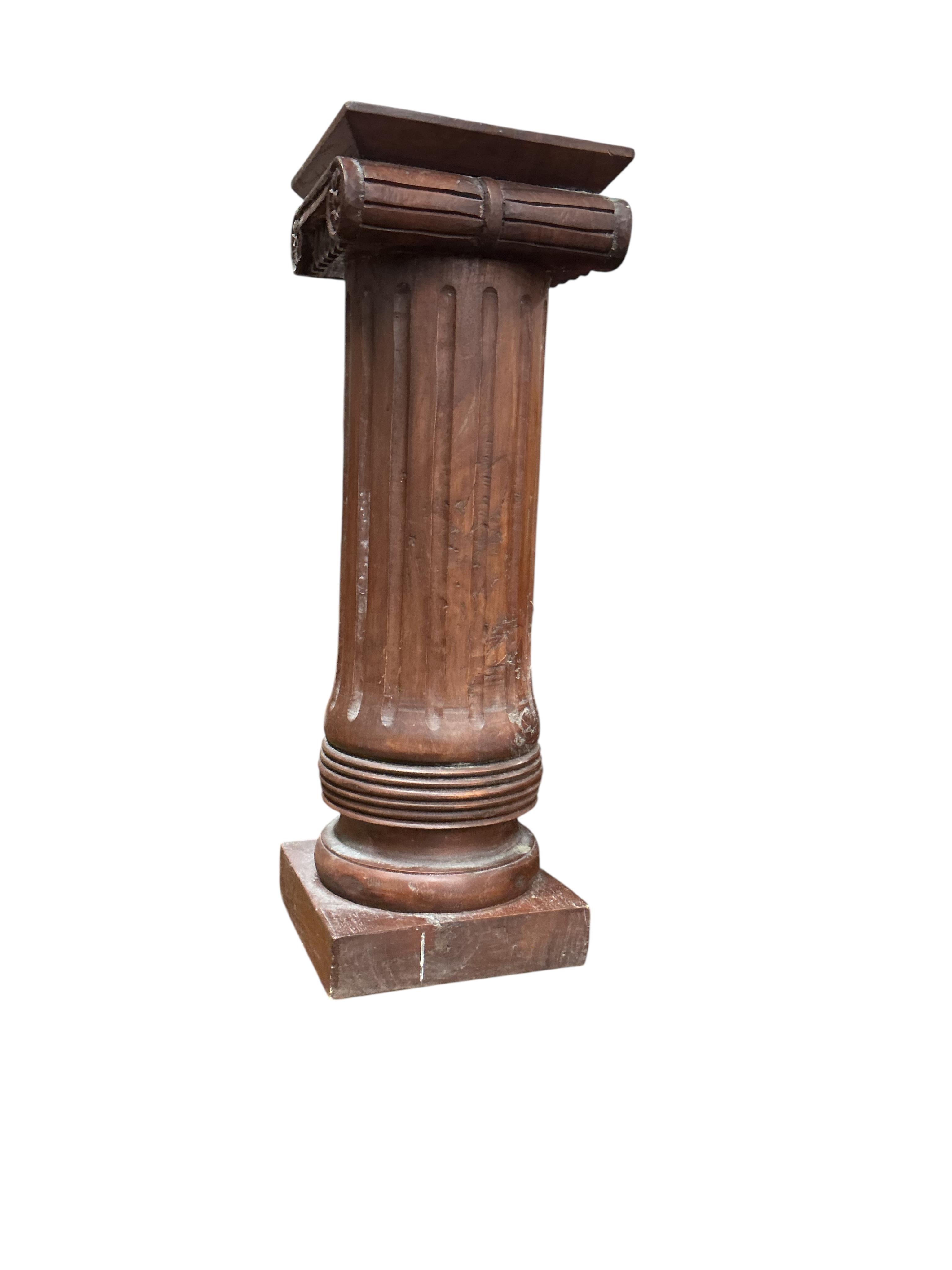 A reproduction mahogany ionic column pedestal, height 62cm